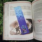 BOOKMARK: Blue Dragon on a Stack of Books